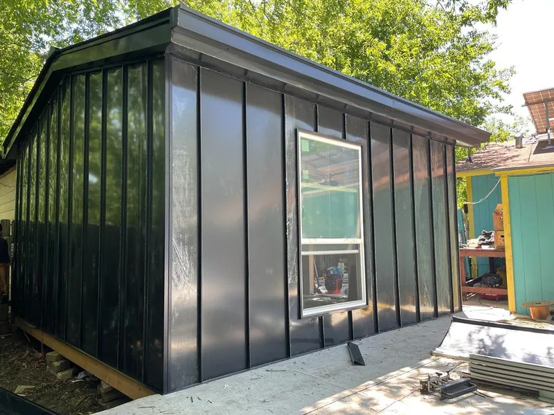 Black standing seam metal wall panels for Metal Roof Installation in Independence