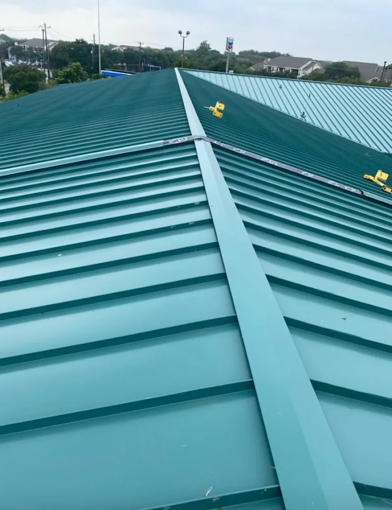 Green commercial metal roof ridge and valley for Metal Roof Repair in Independence